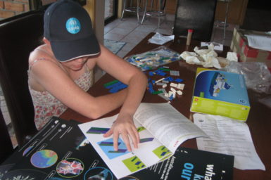 Clare Cameron at home with her LEGO® Investigator (image Catherine Cameron).