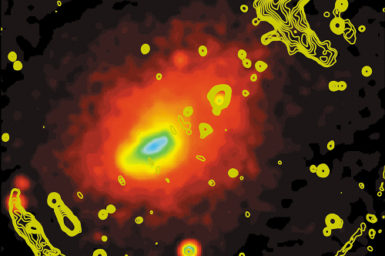 Coloured image of the galaxy cluster with arcs around it.