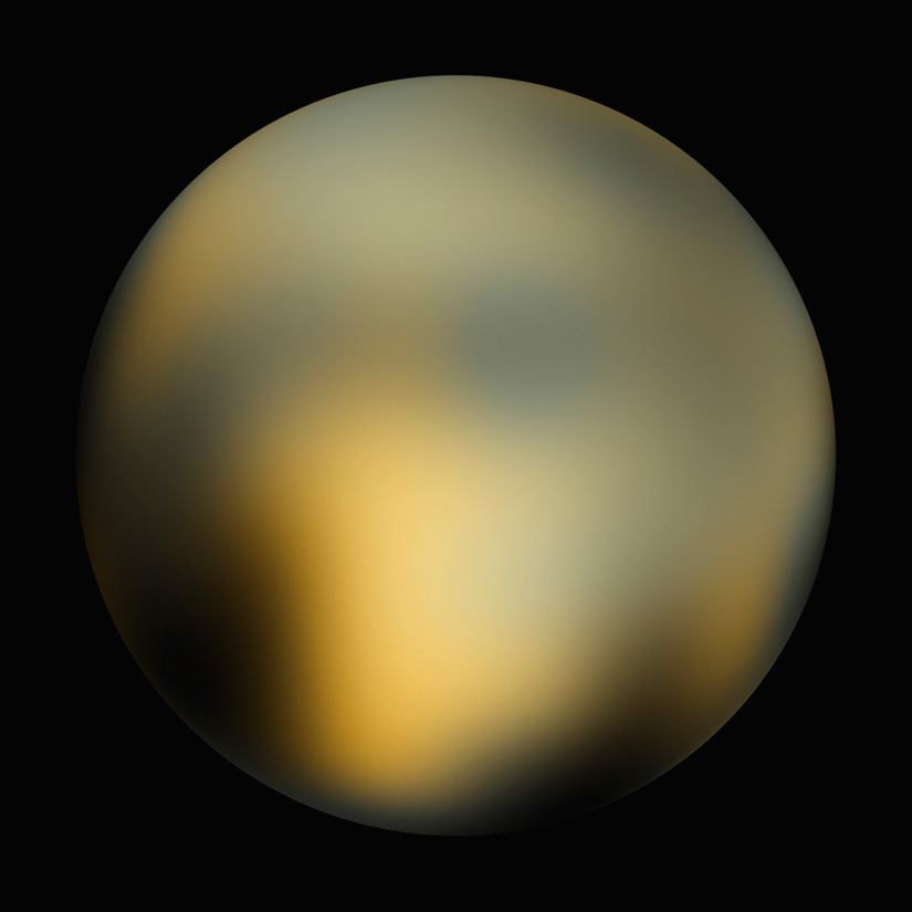 Pluto as seen by the Hubble Space Telescope. Image Credit NASA, ESA and M.Buie (Southwest Research Institute) 