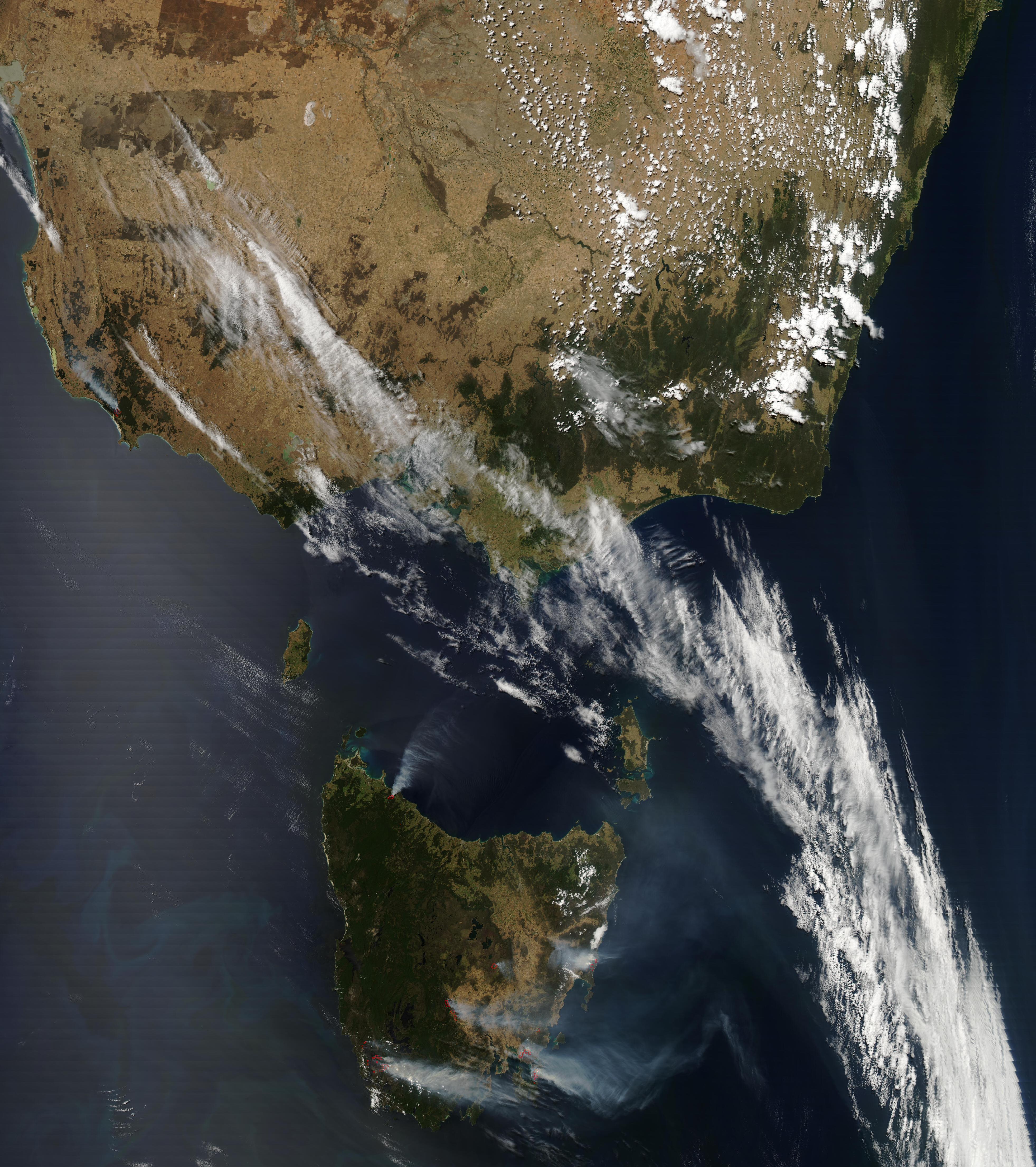 Smoke plumes from fires burning through Tasmania and Victoria over the 2012-13 season. Image: NASA Earth Observing System Data and Information System