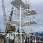 RV Investigator's main mast fitted to the top of the ship