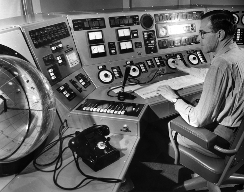 Astronomer Frank Kerr at the control desk of the Parkes radio telescope in 1962.