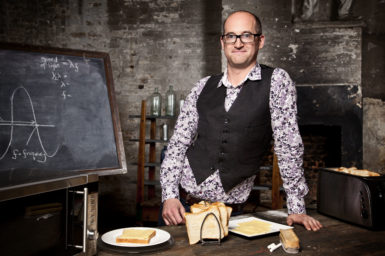 Mark Miodownik, measures the speed of light using cheese on toast.