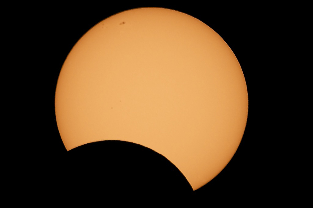 The partial eclipse captured through a telescope - not quite the "ring of fire" but spectacular all the same.