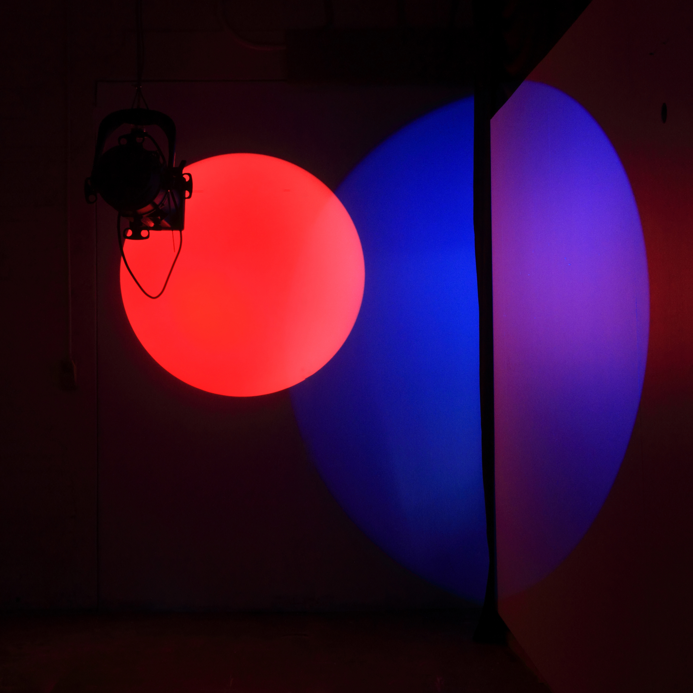 Two large spots of light, red and blue.