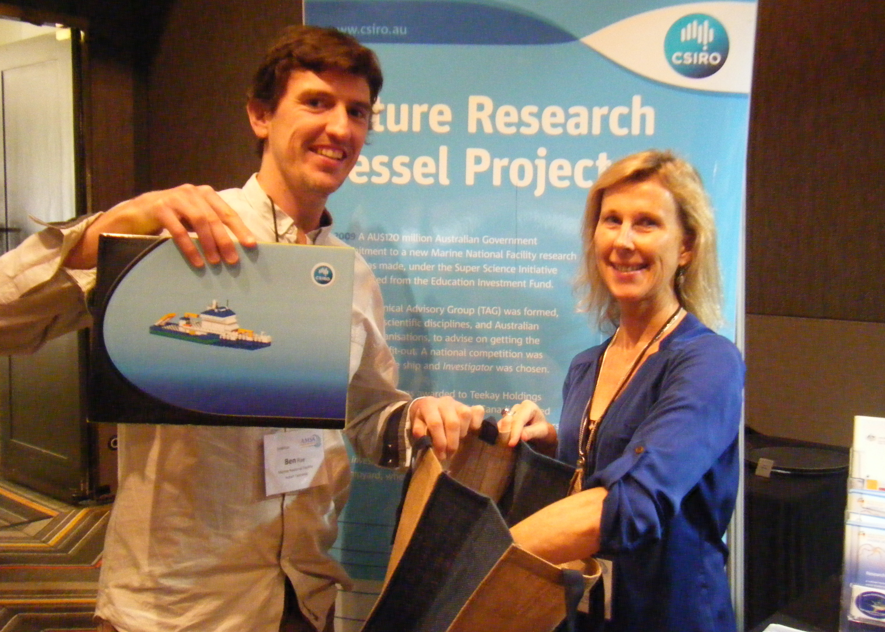 Dr Scarla Weeks from the University of Queensland drawing the winner with Ben Rae from the FRV Project
