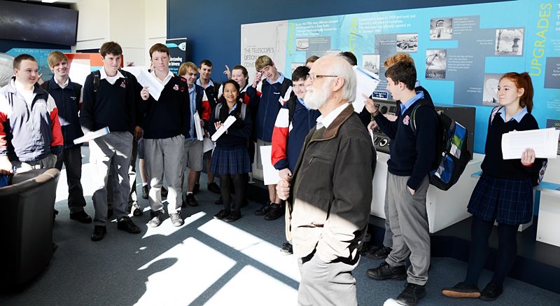 Parkes High School students meeting Professor Ron Ekers in the Parkes Observatory Visitor Centre.