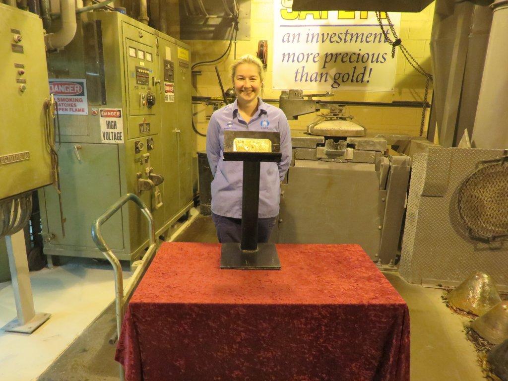 Danielle Hewitt with the first gold bar produced using the new process. 