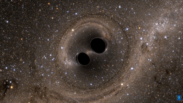 A shot from a computer simulation shows two black holes spiralling towards each other, eventually colliding and merging into one. The gravitational waves caused by the event have been detected by LIGO with the help of CSIRO and a number of Australian universities. Image credit: LIGO, SXS