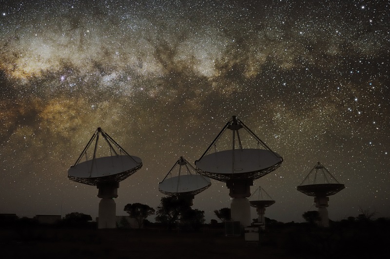 Night time view of dishes that are part of the Australian Square Kilometre Array Pathfinder (ASKAP) - a next-generation radio telescope in remote Western Australia