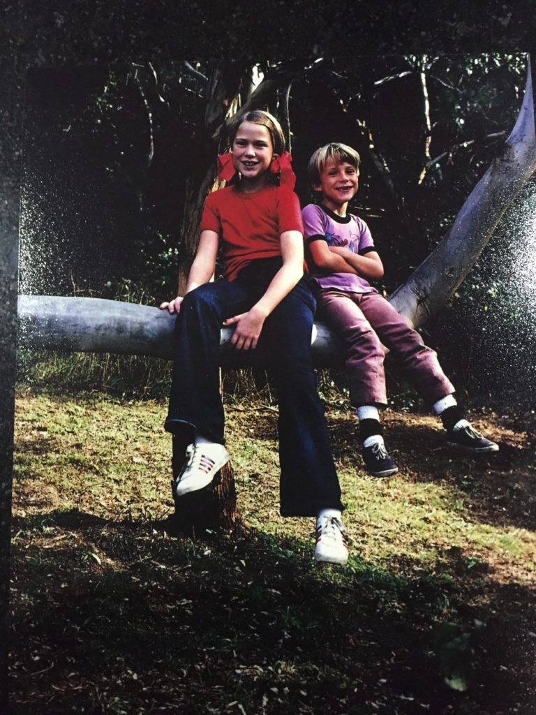 Glenda Harry and her brother Rowan as children in the early 1970s in the backyard of the family home at Wye River.