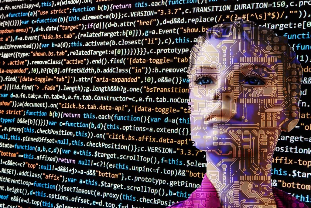 A human-looking robot behind graphics of computer code