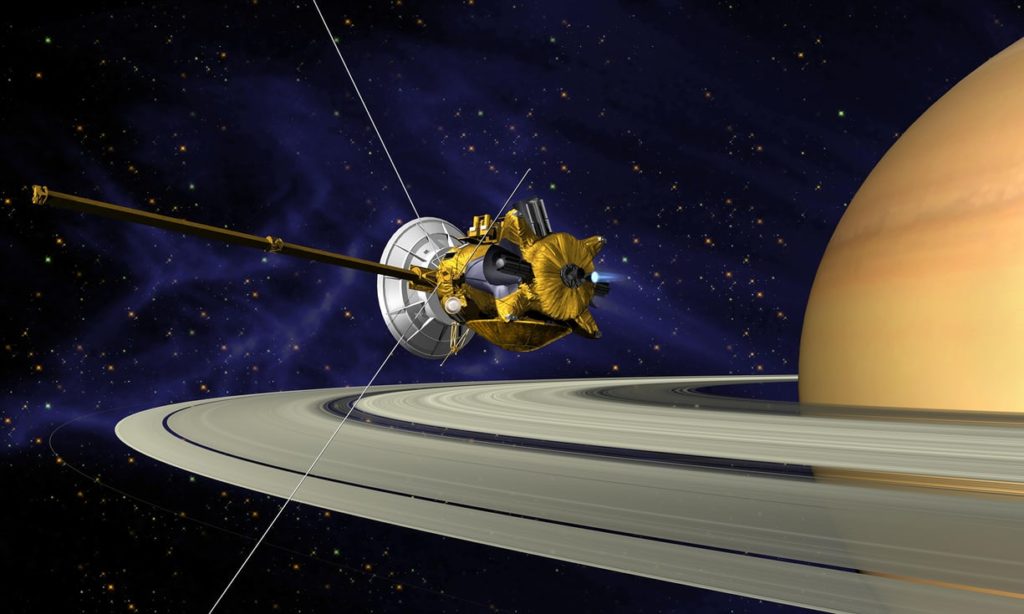 A concept drawing of the probe Cassini near Saturn