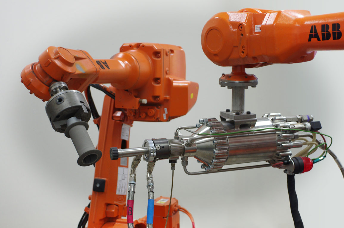 We're using robots to deposit powdered metal onto surfaces faster than the speed of sound.
