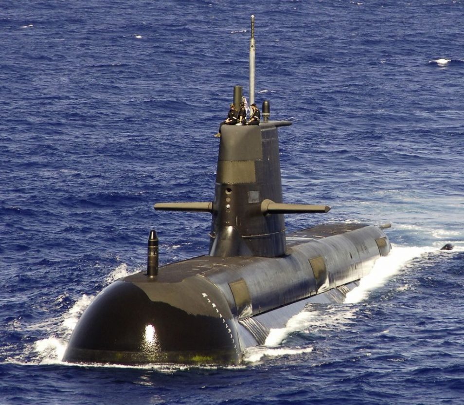 submarine partially submerged in water