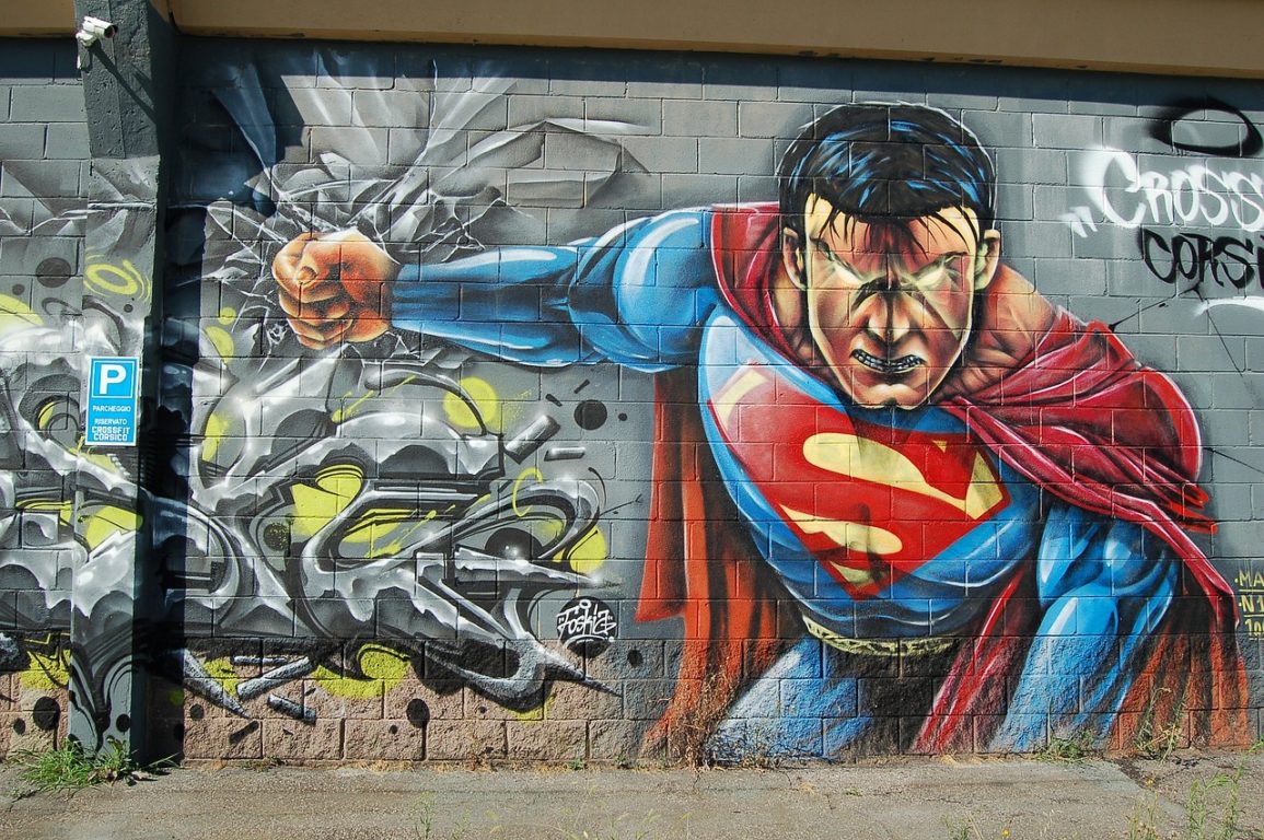 street art mural of superman with glowing eyes
