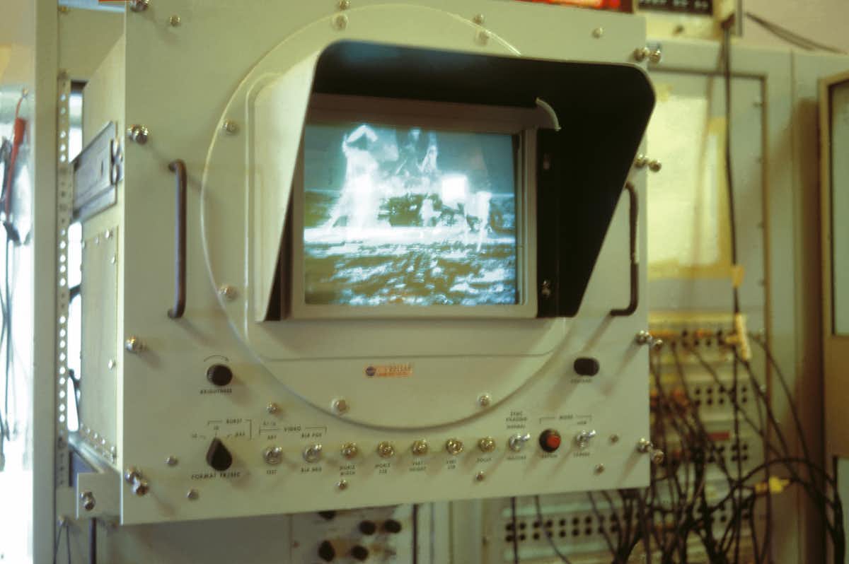 A close-up shot of the monitor showing the moonwalk signal from Apollo 11 as it happened