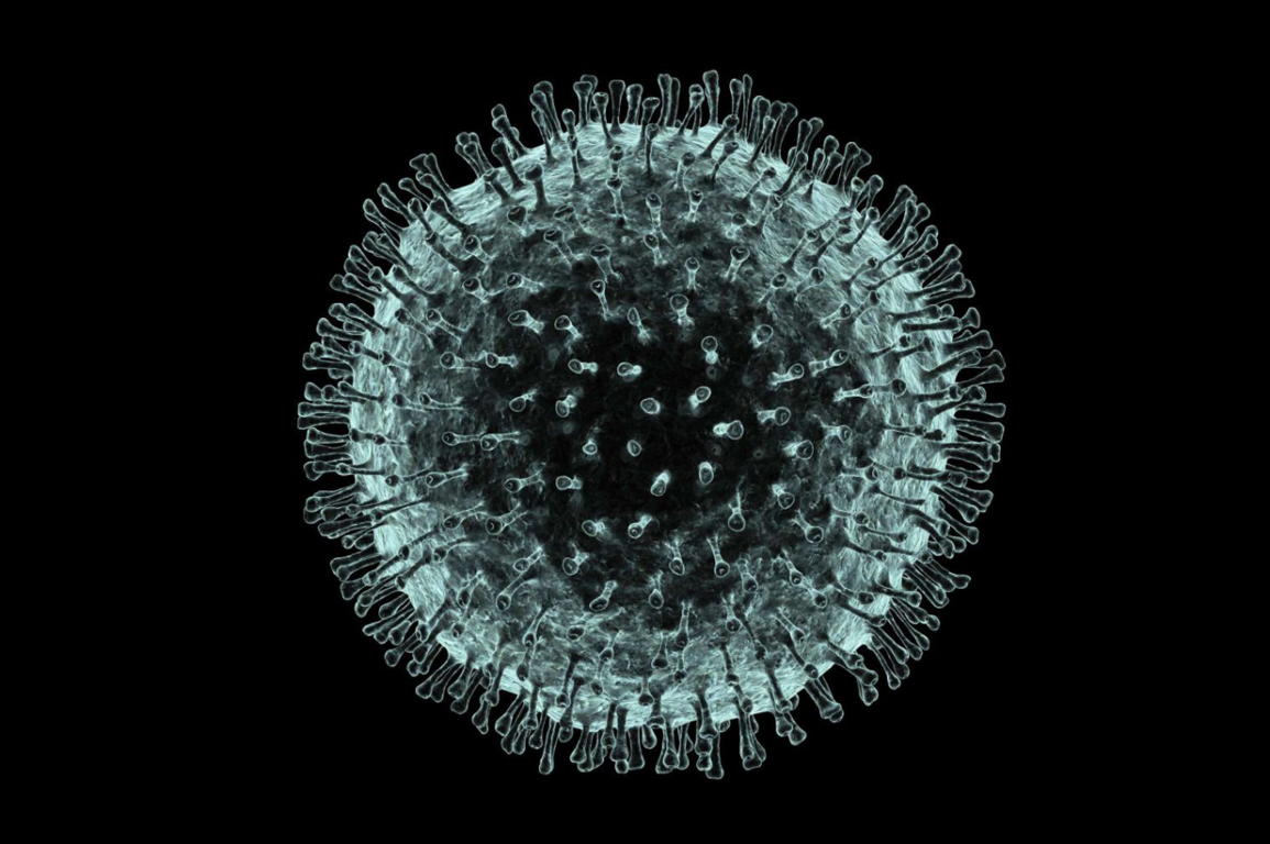 A floating blue coronavirus cell covered in dots.