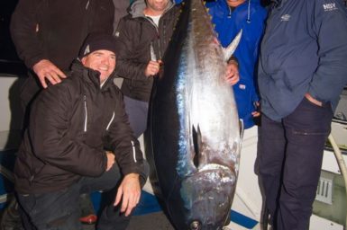 Five men with record tuna fish