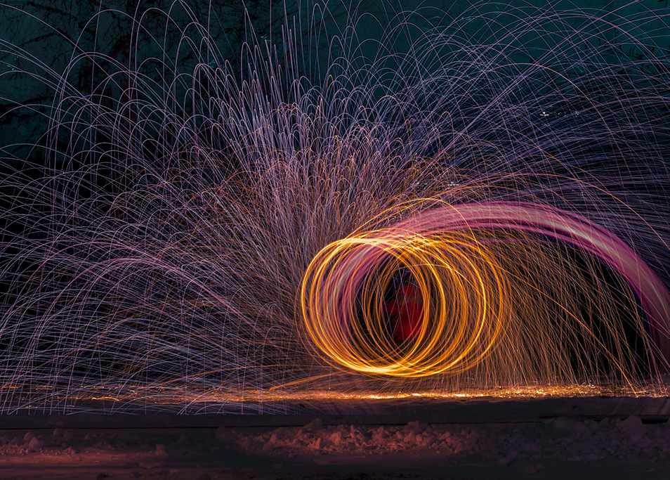 A timelapse photo shows sparks flying