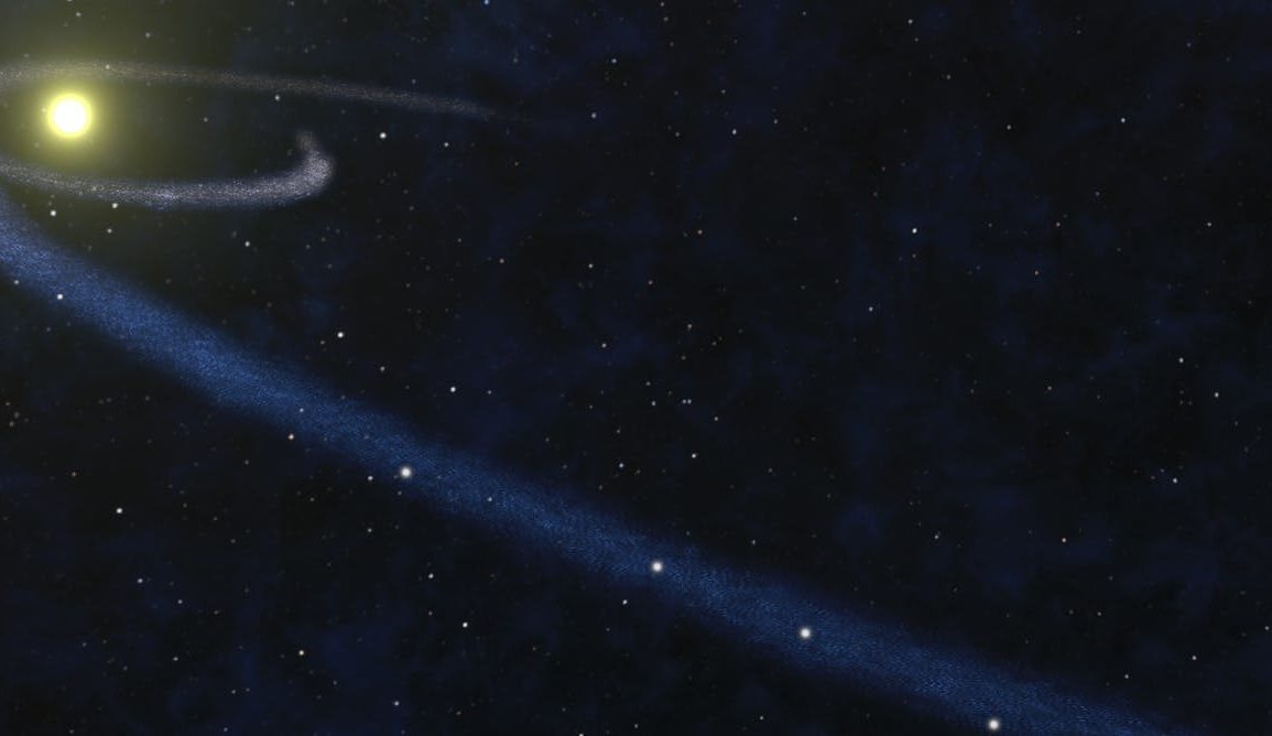 Artist's impression of a thin gas cloud formed by tidal disruption from a passing star. Scientists think this is one of the possible ways the cold clump of gas detected in the study could have been formed