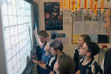 Image of students in a classroom playing Killer Sudoku