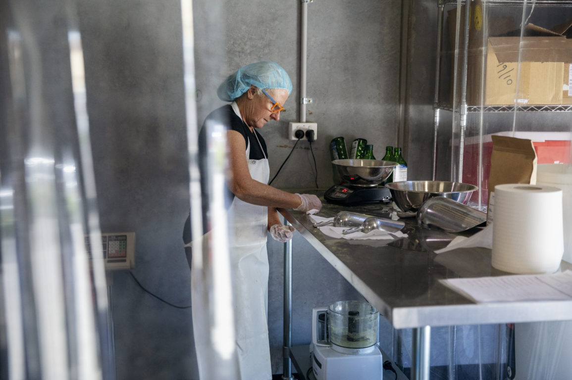 Image of person in a commercial kitchen.