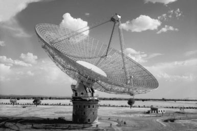 A black and white photo of Parkes radio telescope which opened 60 years ago.