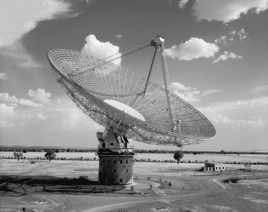A black and white photo of Parkes radio telescope which opened 60 years ago.