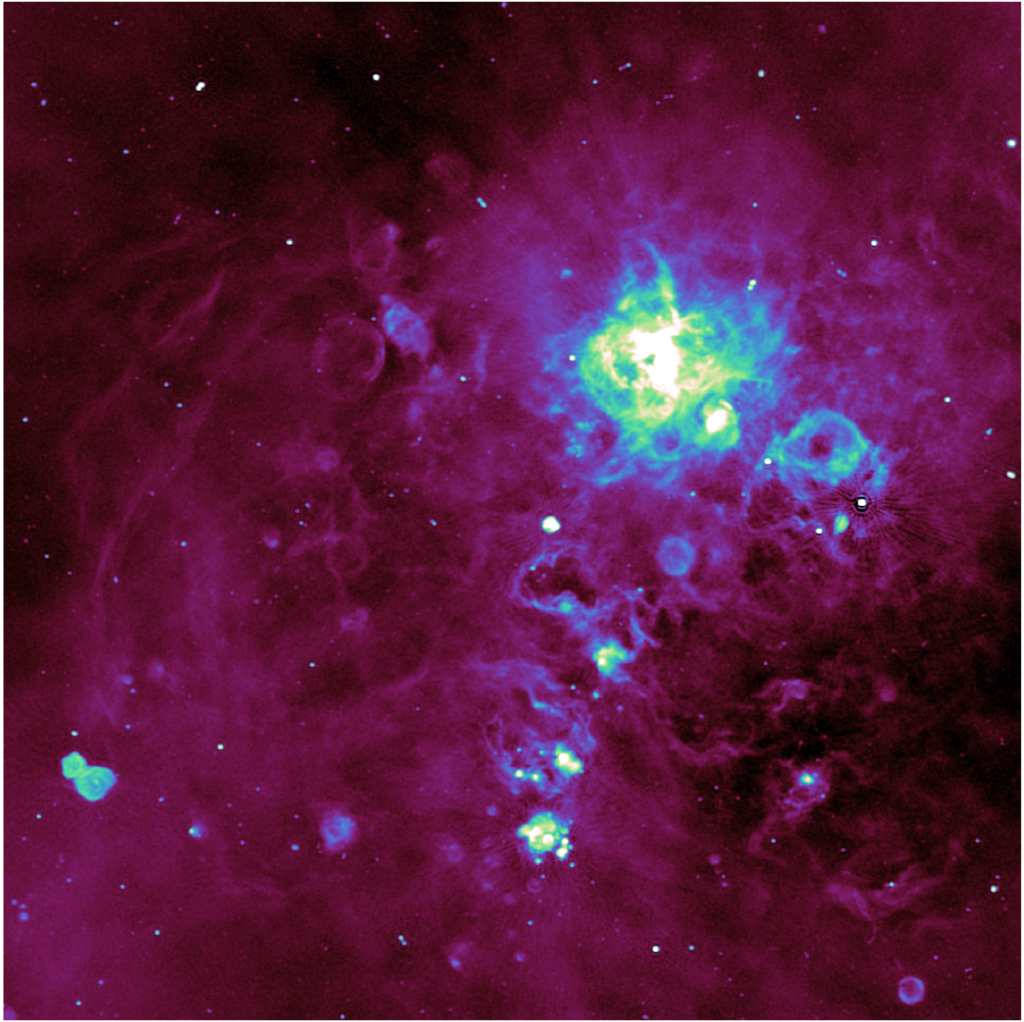 Top 10 images from ASKAP. Swirling colours of interstellar gas, going from dark purple through green to bright white.