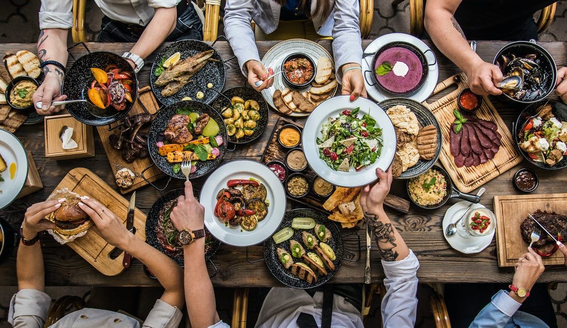 A table filled with food and photographed from above