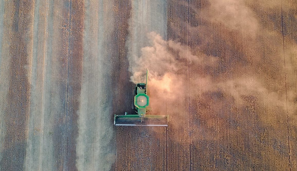 A birds eye view of a tractor in a field