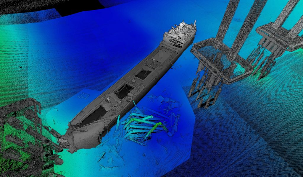 A digital map of the seafloor showing the wreck of a ship and bridge pylons.