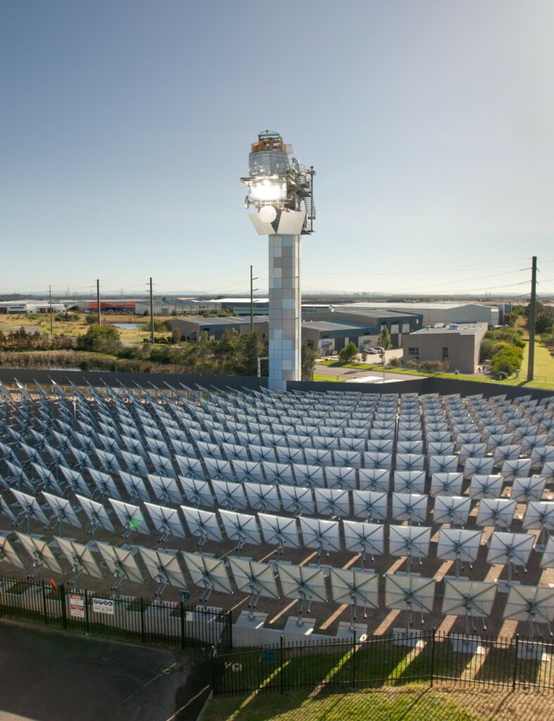 Sun-tracking mirrors (heliostats) focus sunlight on a central receiver or power tower at CSIRO Energy in Newcastle
